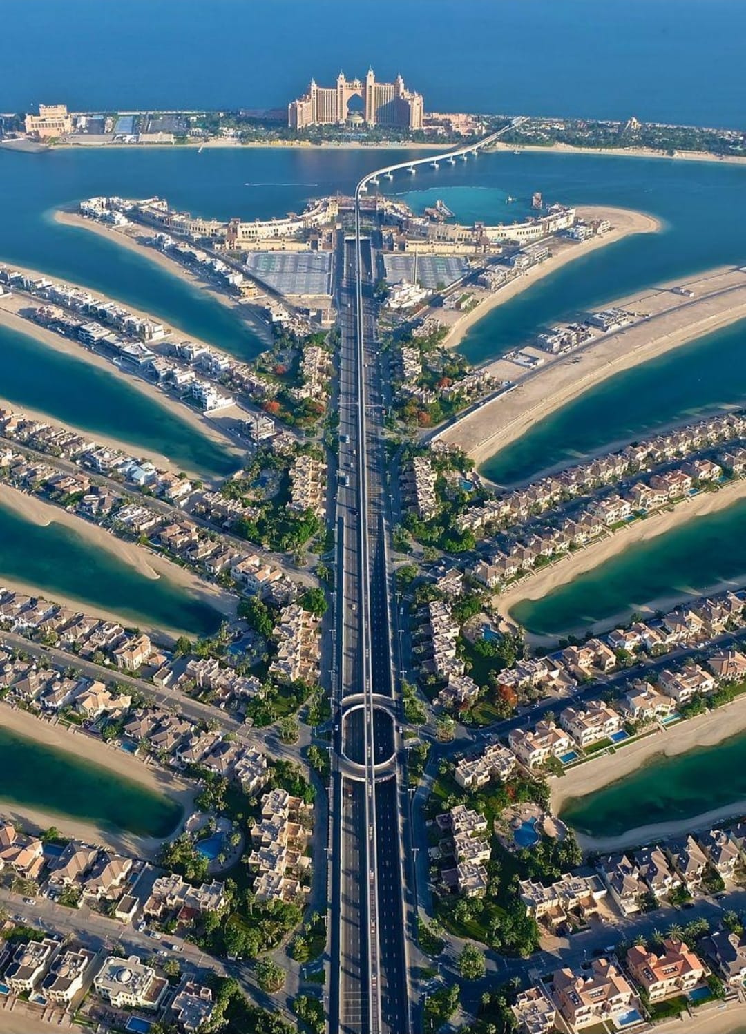 Aerial view of Palm Jumeirah fronds, villas and Atlantis in Dubai