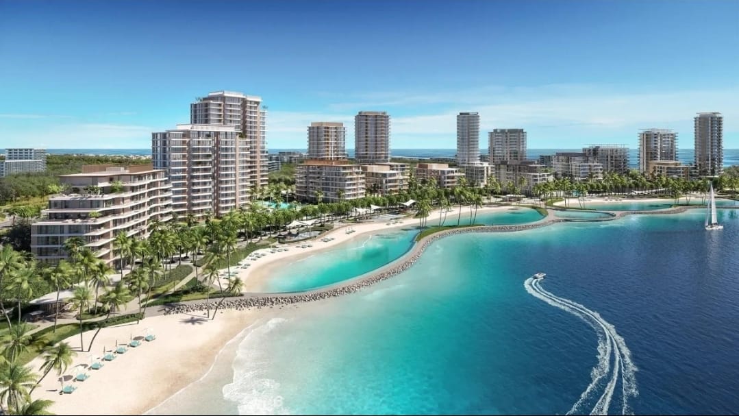 Coastal high-rise residences and turquoise lagoon at Dubai Islands