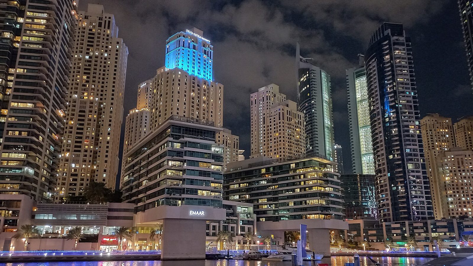 Waterfront residential towers at Dubai Marina at night